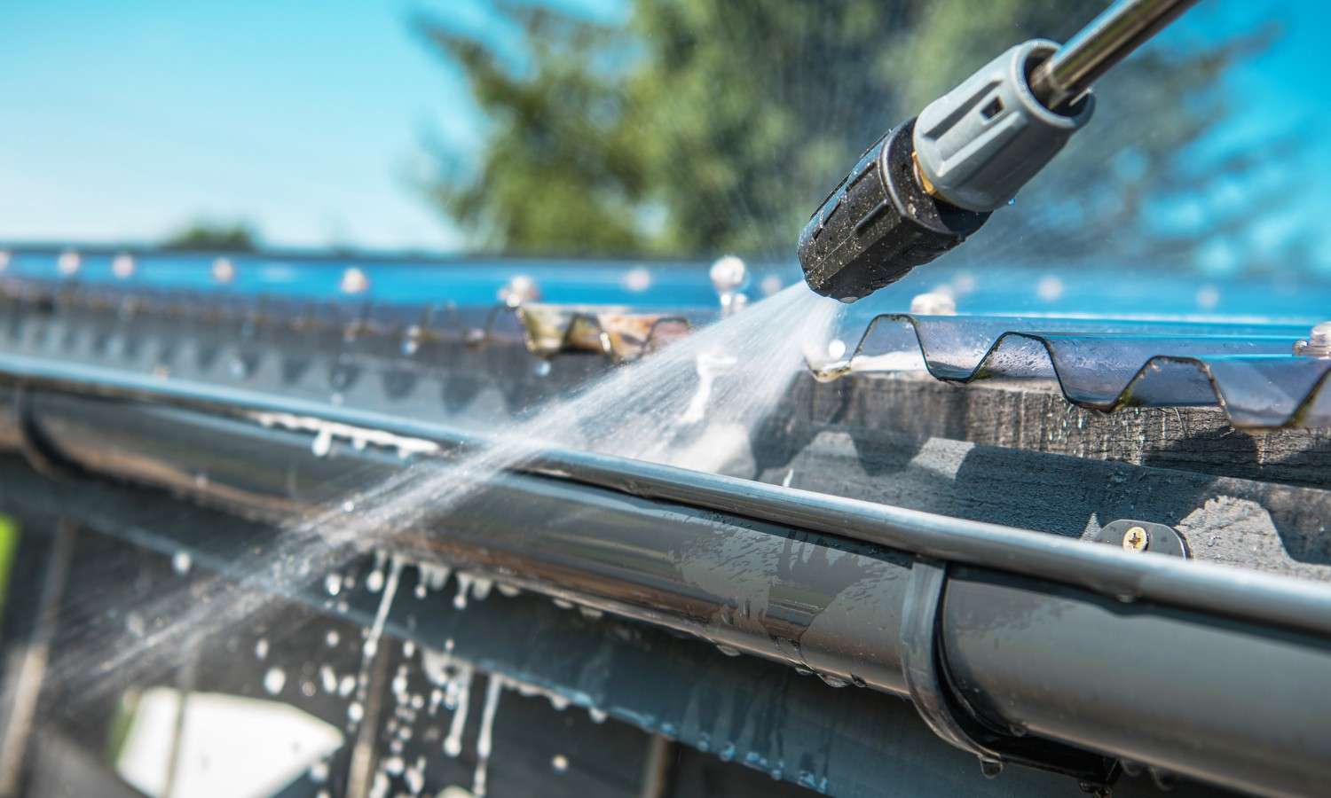 Gutter being cleared and washed out