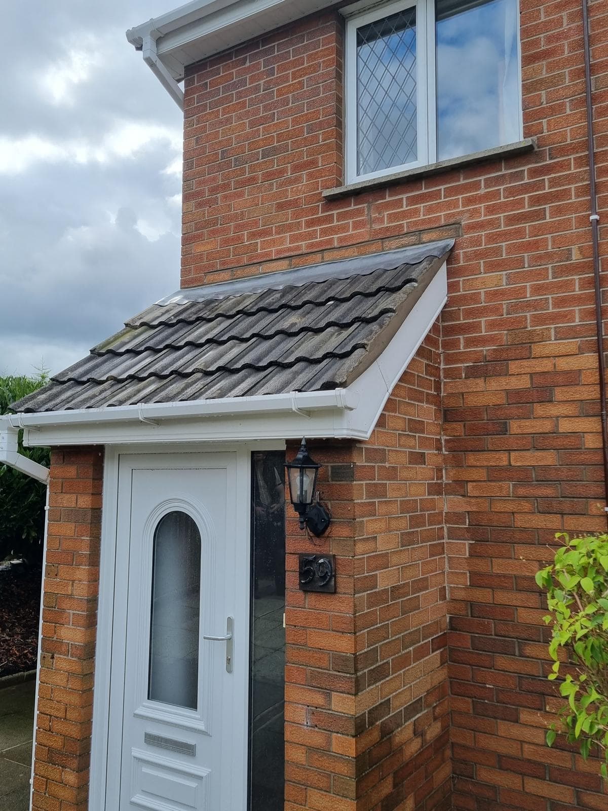 Newly re-tiled roof and canopy