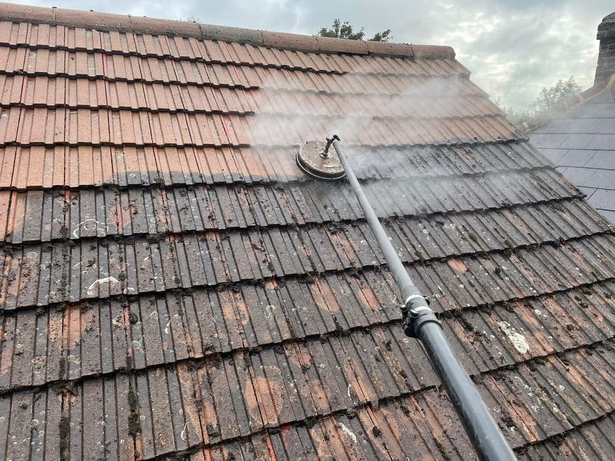 Roof steam cleaning, moss and grime lifted off the tiles